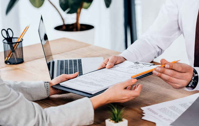 Claims-Edge2 Two people shaking hands